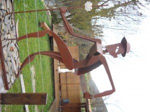  Art in the garden of a bar advertising for pilgrims 